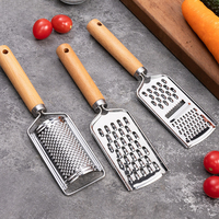Manche en bois Gadgets de cuisine en acier inoxydable Râpe à fromage et légumes Trancheuse à mandoline sûre