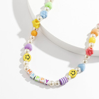 Collier de perles de riz colorées perlées à la main en gros mixte Style ethnique collier en acrylique poterie douce irrégulière pour les femmes