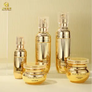 wholesale cosmetic container skincare bottle packaging luxury set lotion pump cosmetic glass bottles gold pump top lid