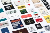 Étiquettes de marque de vêtements personnalisées étiquettes de vêtement lavables imprimées insigne de logo patch TOPONO matériel personnalisé et pli pour sacs à vêtements