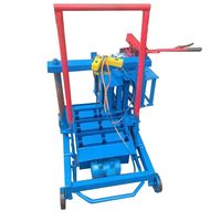 Machine de fabrication de briques à haut rendement Brique standard Petite mini machine de fabrication de blocs creux mobile manuelle Produits Ciment