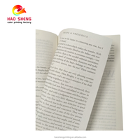 Impression de livres à couverture souple personnalisée avec estampage à chaud or, reliure parfaite, papier offset, design multifonctionnel pour la promotion d'entreprise
