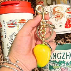 Nouveau porte-clés en résine de mangue, pendentif fruit de dessin animé mignon pour clés de voiture et sacs à dos, mini accessoires jaune-vert, cadeaux en gros - Product Image 3