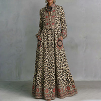 Robes longues trapèze à taille haute boutonnées, imprimées léopard contrastant, avec poches et col montant à empiècements