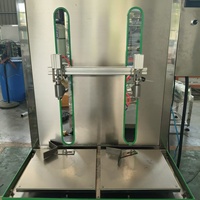 Petite machine de remplissage de liquides par pesage pour l'huile, machine de remplissage par pesage à 2 têtes avec moteur servo