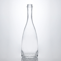Botella de Vidrio Transparente de 700ml/750ml con Base Floral, Base Pesada y Forma Cónica para Envasado de Licores