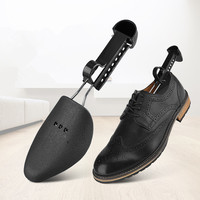 Porte-botte d'arbre à chaussures en plastique pratique pour hommes 1 paire Support de forme de chaussure de civière de chaussure émis en usine