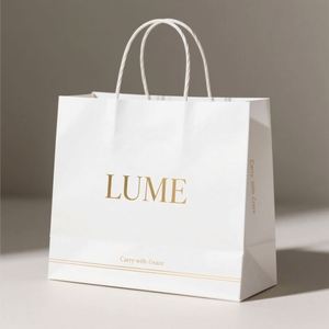 Customizable Flexographic Printed Recycled Kraft Paper <b>Bags</b> with Patch Handles for Elegant Gift Packaging - Product Image 2