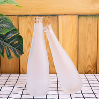 OSHOW Gros 330ml Dépoli En Forme De Goutte de Fruits Jus De Vin Vodka Evian Bouteille En Verre Avec Bouchon À Vis