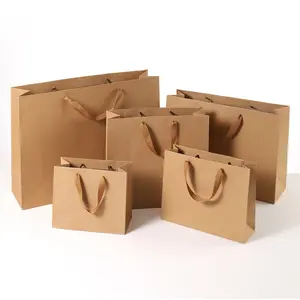 Bolsa de compras marrón de lujo con logotipo Mango de cuerda trenzada para ropa Embalaje personalizado para zapatos Bolsa de papel de regalo
