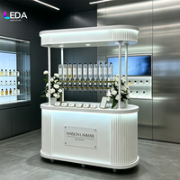 Chariot de présentation mobile blanc LEDA pour événements de mariage, bar à parfums avec auvent et éclairage LED