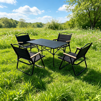 Table de camping pliable en tissu avec cadre en métal noir à bas prix et chaise avec accoudoirs pour pique-nique en plein air