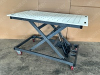 Table de soudage industrielle à hauteur réglable avec mécanisme de levage