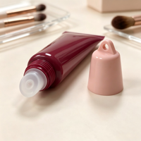 Tube souple brillant pour gloss cosmétique, couleur bordeaux, avec capuchon rose à suspendre, embout oblique rond, accessoires de suspension disponibles