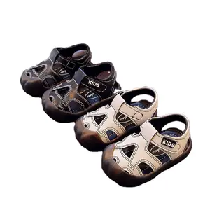 Süper yumuşak çocuk ayakkabıları yaz bebek plaj ayakkabısı bebek Hollow Anti tekme yürüyüş ayakkabısı çocuk Baotou sandalet