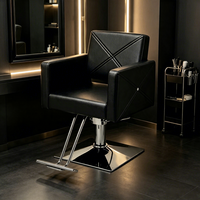 Chaise de coiffeur professionnelle hydraulique inclinable avec appui-tête et repose-pieds réglables pour la coupe de cheveux