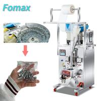 Machine de remplissage automatique multifonctionnelle pour pilules, vis, boulons métalliques et bobines d'acier, avec fonction de comptage et d'emballage rotatif