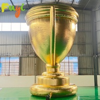 Trophée gonflable géant publicitaire en nylon de haute qualité 2026 avec pompe à air électrique, conception personnalisée pour la promotion