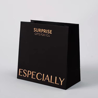 Logo personnalisé de luxe emballage de détail de vêtements sac en papier de feuille d'or avec poignée de ruban pour cadeau shopping promotion pour chaussettes