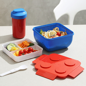 Boîte à lunch créative style blocs de construction Deux compartiments détachables sans BPA Passe au <span class=keywords><strong>lave</strong></span>-<span class=keywords><strong>vaisselle</strong></span> Boîte à bento pour enfants - Product Image 1