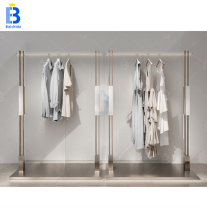 Estante de ropa de Boutique De Oro Ecológico portátil moderno Estantes de exhibición de diseño interior de tienda minorista bonita - Product Image 5