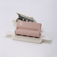 Perforateur à disque 4 trous en forme de champignon marqué pour planificateurs de feuilles de papier de recharge Outil de perforation