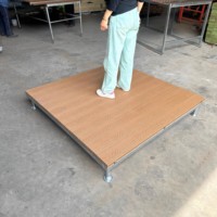Plancher modulaire préfabriqué en composite bois-plastique traité pour plateforme de camping extérieure et support de tente