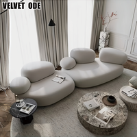 Nouveauté Canapé en tissu de luxe haut de gamme en forme de galet Cadre en bois massif Structure robuste Meubles durables pour villa et appartement