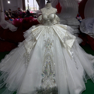 Vestido de Novia Elegante Mc064 Color Marfil con Cuello Alto, Manga Capa con Lazo Grande, Encaje con Cuentas, Estilo Princesa y Cola Catedral Jancember - Product Image 1