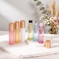 Vente en gros de flacons à bille en verre translucide coloré de 10 ml, flacons vides pour huiles parfumées, couleurs assorties pour l'identification des senteurs