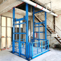 Plateforme élévatrice hydraulique à rail de guidage, directement de l'usine, pour le transport de marchandises entre étages industriels