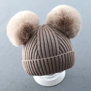 Оптовая продажа, новые дизайнерские зимние детские шапки с помпоном из искусственного меха