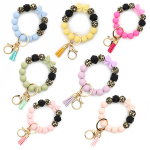 Silicone Beaded <b>Keychain</b> Bracelet With Daisy Charm And Carabiner Clasp In Pastel Colors - Product Image 6
