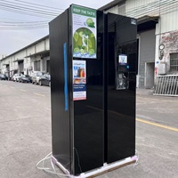 Réfrigérateur à double porte de 573 L avec refroidissement par air à fréquence variable et système anti-givre, équipé d'un distributeur d'eau pour usage domestique