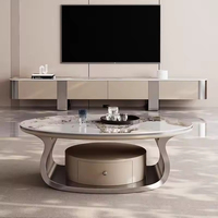 Table basse de luxe moderne haut de gamme au design créatif et minimaliste, plateau en pierre pour salon