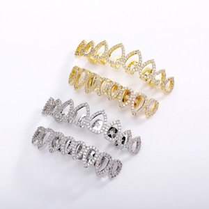 Grillz para dientes con forma de lágrima, incrustaciones de circonita, en oro y plata, accesorios dentales unisex para uso diario. - Product Image 1