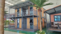 Casa de contenedores de acero y madera de dos pisos, piso desmontable con baño y cocina para hoteles y apartamentos