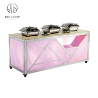 Mobilier italien à LED pour événements, table de buffet d'hôtel à plateau en pierre de marbre avec chauffe-plats, table de buffet à induction