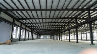 Entrepôt préfabriqué en structure légère en acier sur mesure en Chine avec services de soudage de la part d'une usine de structures en acier