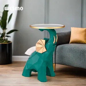 Statue d'éléphant en polyrésine moderne disponible en stock ornement sur pied pour décor de salon design animal élégant