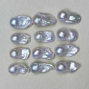 ไข่มุกน้ำจืดธรรมชาติทรงหางปลา ขนาด 11-13 มม. สไตล์บาโรก สีสันสดใส แสงเงาสวยงาม ไข่มุกเปลือยจากจูจี้ - Product Image 1