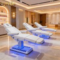 Table de massage électrique inclinable moderne pour salon de beauté et spa, 3 moteurs, en cuir PU et acier inoxydable, pour salon.