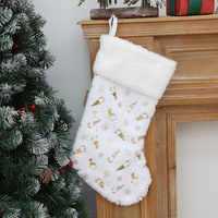 Nouvelle collection : Sac cadeau de Noël en tissu blanc avec garniture en peluche lapin, motifs flocons de neige dorés en relief