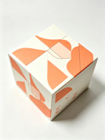 Boîte cadeau rigide carrée à motifs géométriques, boîte en papier d'art orange et blanc personnalisée pour l'emballage de cosmétiques et de cadeaux
