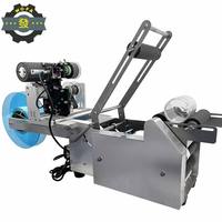Machine d'étiquetage de bouteilles rondes semi-automatique électrique avec applicateur d'étiquettes rotatif motorisé pour les bouteilles de boissons et de cosmétiques