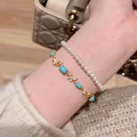 Parure de bijoux vintage artisanale exquise en turquoise ovale brossée avec papillon : bague, bracelet, collier et boucles d'oreilles
