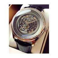 Montres de collection en acier pour entreprises, avec mouvement automatique japonais, design d'usine et personnalisables, à cadran squelette similaire, pour marque privée