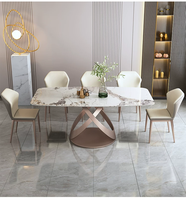 Table à manger rectangulaire en pierre frittée brillante de luxe léger, style célébrité internet, en acier au carbone, mobilier de maison assemblé