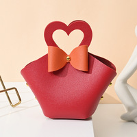 Boîte à bonbons de mariage en cuir portable créative Mini sac à main Style sac cadeau pour la distribution de faveurs de mariage Bonbons de Noël