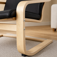 Fauteuil de loisirs moderne en bois massif avec design personnalisé pour salon, finition naturelle, idéal pour la maison ou le bureau.